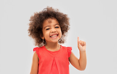 Image showing little african american girl pointing finger up