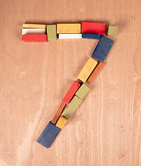 Image showing Old wooden blocks, toghether they make the number 7