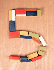 Image showing Old wooden blocks, toghether they make the number 5