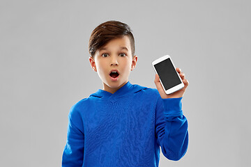 Image showing shocked boy in blue hoodie showing smartphone