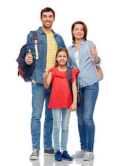 Image showing happy family with travel bags showing thumbs up