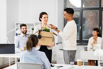 Image showing new female employee meeting colleagues at office