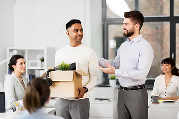 Image showing new male employee meeting colleagues at office