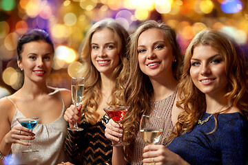 Image showing happy women drinks in glasses at night club
