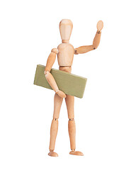 Image showing Wooden mannequin carrying a wooden block