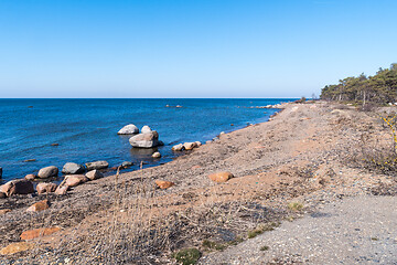 Image showing Seashore with blue water and blue sky