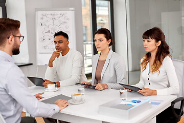 Image showing recruiters having job interview with male employee