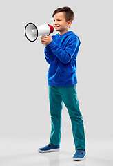 Image showing smiling boy speaking to megaphone