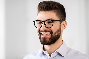 Image showing portrait of smiling bearded businessman in glasses