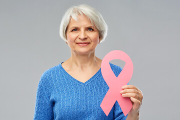 Image showing old woman with pink breast cancer awareness ribbon