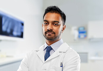 Image showing indian dentist in white coat at dental clinic