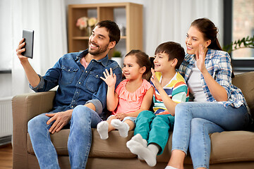 Image showing happy family having video call on tablet computer