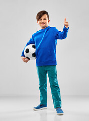 Image showing smiling boy with soccer ball showing thumbs up