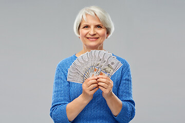 Image showing senior woman with hundred dollar money banknotes