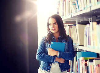 Image showing high school student girl with book at library