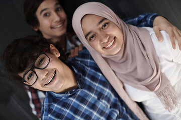 Image showing group of arab teens taking selfie photo on smart phone
