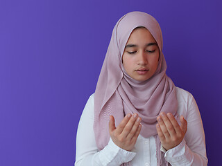 Image showing female muslim praying with opend hands