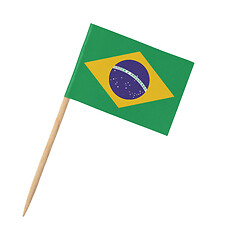 Image showing Small paper Brazilian flag on wooden stick