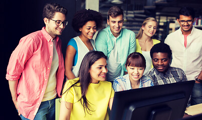 Image showing international students with computers at library