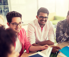 Image showing group of high school students sitting at table