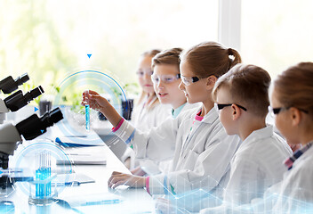 Image showing kids with test tubes studying chemistry at school