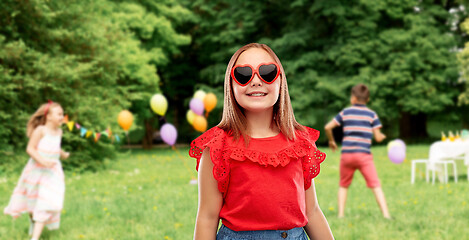 Image showing girl in heart shaped sunglasses at birthday party