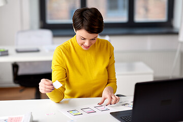 Image showing ui designer working on user interface at office