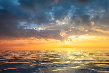 Image showing a golden sunset at the ocean