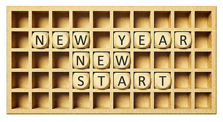 Image showing a wooden grid with cubes new year new start