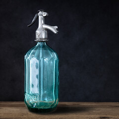 Image showing vintage turquoise soda glass bottle