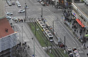 Image showing BERLIN, GERMANY on December 31, 2019: People pass tram ways in t