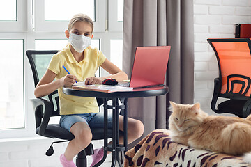 Image showing Self-taught quarantined girl at home