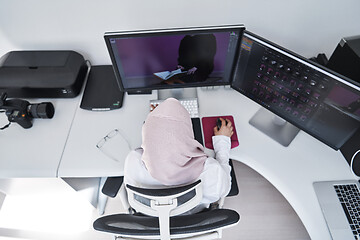 Image showing Arabic creative professional  working at home office top view