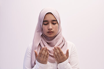 Image showing female muslim praying with opend hands