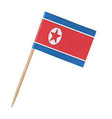 Image showing Small paper North Korean flag on wooden stick