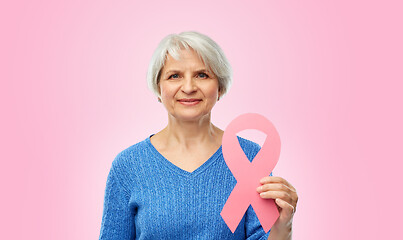 Image showing old woman with pink breast cancer awareness ribbon