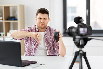 Image showing video blogger with computer mouse videoblogging