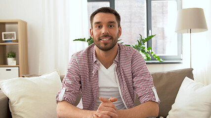 Image showing male blogger videoblogging at home