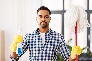 Image showing indian man with mop and detergent cleaning at home