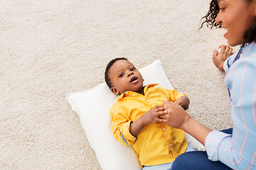 Image showing happy african american mother with baby at home