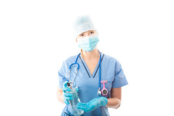 Image showing Nurse or doctor holding hand sanitizer