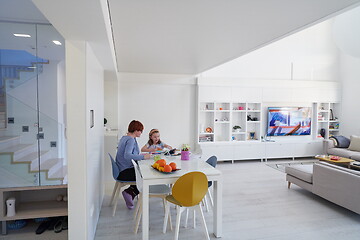 Image showing Mother and little daughter  playing together  drawing creative a