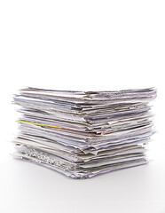 Image showing Large pile of waste paper isolated on white