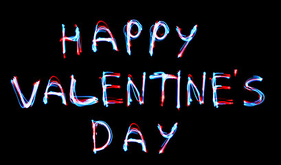 Image showing Glowing inscription happy Valentines day on a black background