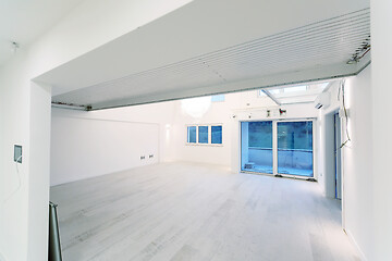 Image showing Interior of empty stylish modern open space two level apartment