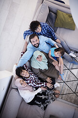 Image showing muslim family portrait  at home top view