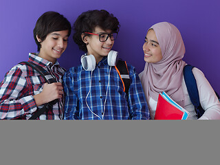 Image showing Arab teenagers group working on laptop  computer together