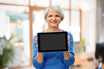 Image showing senior woman using tablet computer