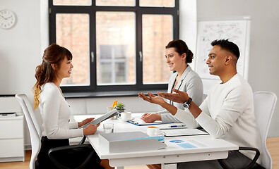 Image showing recruiters having job interview with employee