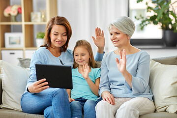 Image showing mother, daughter and grandmother with tablet pc